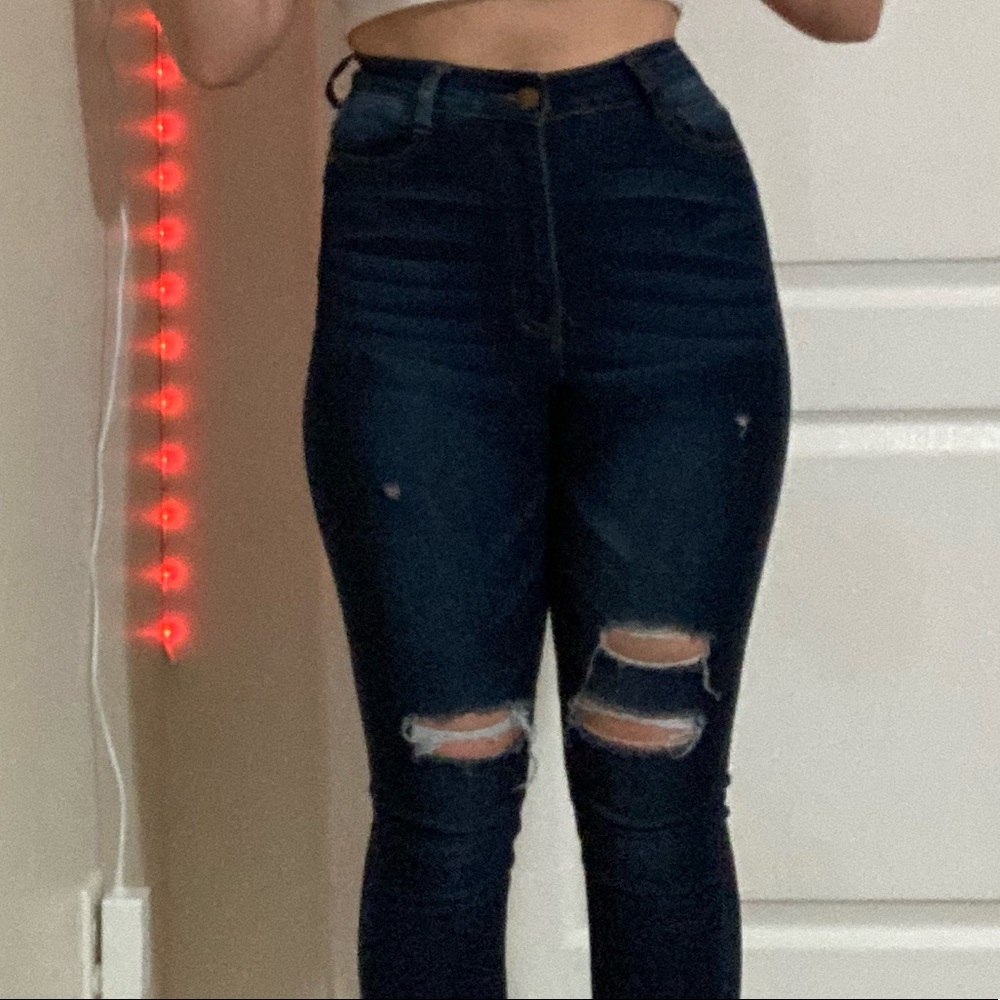 extremely high waisted ripped jeans